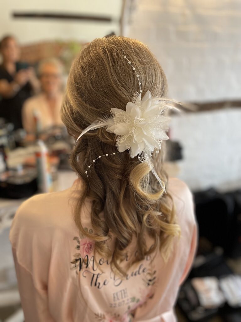 Berkshire bride long natural hair with fascinator